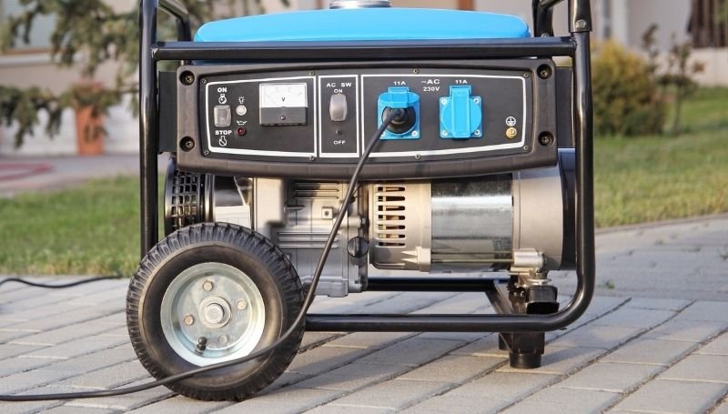 side view of a blue dual fuel generator showing different features