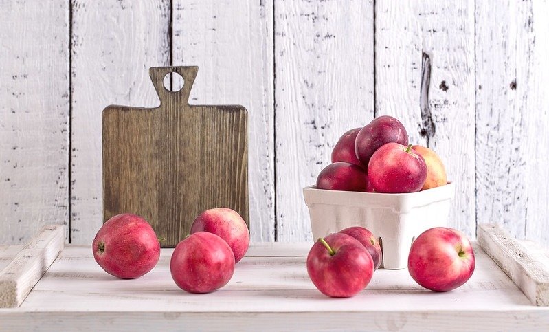 ripe red apples on the table